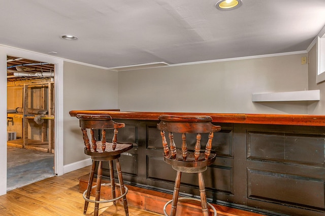 456 Ferry Rd, Saco, ME 04072 - indoor dry bar with wood finished floors, crown molding, recessed lighting, and baseboards