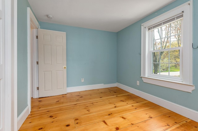 456 Ferry Rd, Saco, ME 04072 - unfurnished room featuring plenty of natural light, light wood-style flooring, and baseboards