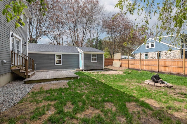 456 Ferry Rd, Saco, ME 04072 - view of yard featuring a fire pit and a wooden deck