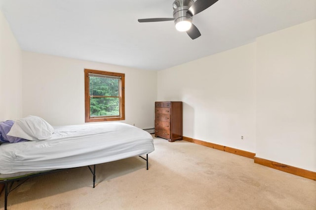 184 Long St, Limerick, ME 04048 - bedroom featuring light colored carpet, a ceiling fan, and baseboard heating
