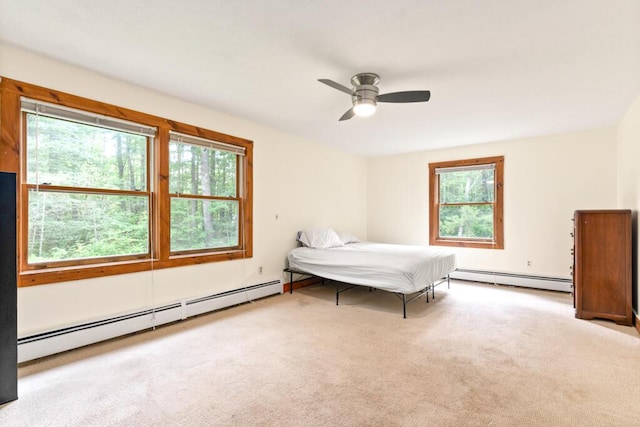 184 Long St, Limerick, ME 04048 - bedroom with baseboard heating, multiple windows, and carpet