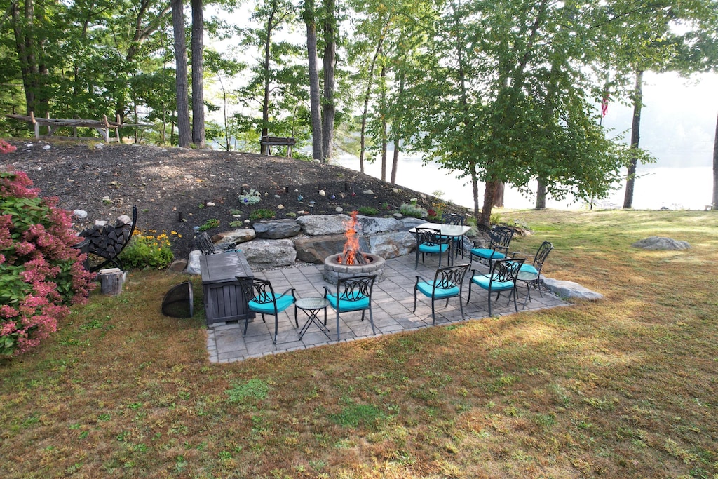 7 Passby Point Rd, Windham, ME 04062 - view of patio / terrace with an outdoor fire pit