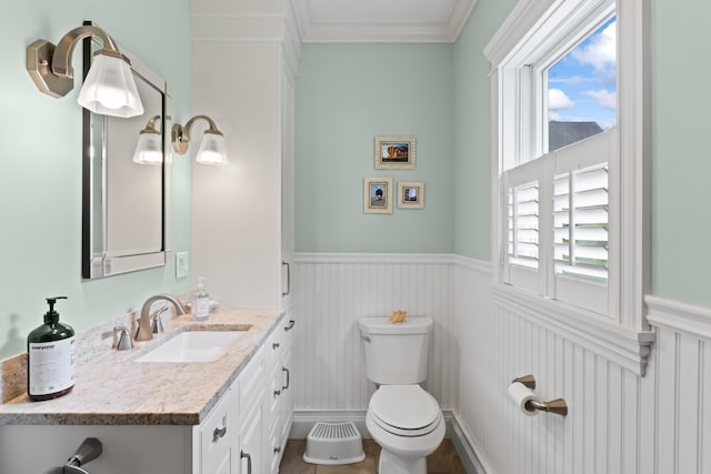 7 Passby Point Rd, Windham, ME 04062 - half bathroom featuring a wainscoted wall, toilet, ornamental molding, healthy amount of natural light, and vanity