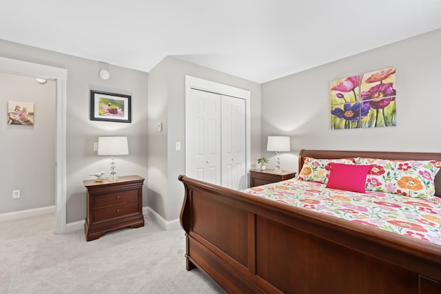 7 Passby Point Rd, Windham, ME 04062 - bedroom with light colored carpet, a closet, and baseboards