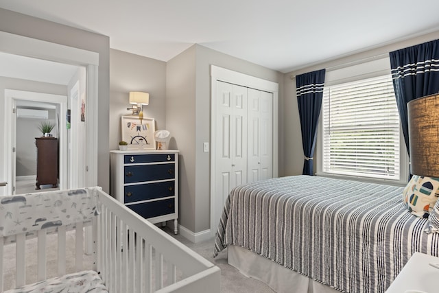 7 Passby Point Rd, Windham, ME 04062 - carpeted bedroom with a wall mounted air conditioner, a closet, and baseboards