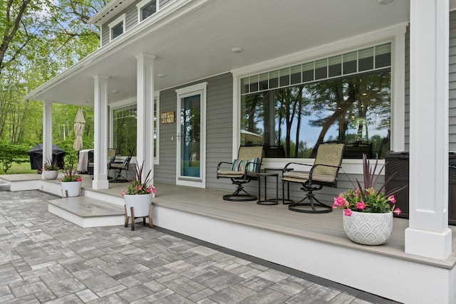 7 Passby Point Rd, Windham, ME 04062 - covered porch with a grill