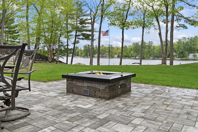 7 Passby Point Rd, Windham, ME 04062 - view of patio with a fire pit and a water view
