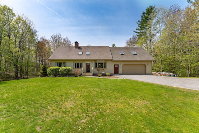 738 Litchfield Rd, Bowdoin, ME 04287 - view of front of home with a garage, driveway, a front lawn, and a chimney