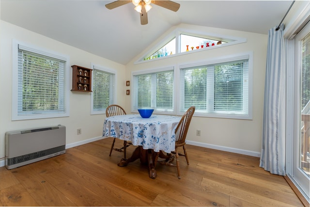 738 Litchfield Rd, Bowdoin, ME 04287 - dining space featuring heating unit, a ceiling fan, light wood-type flooring, vaulted ceiling, and baseboards