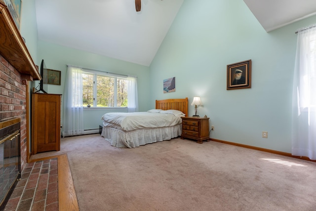 738 Litchfield Rd, Bowdoin, ME 04287 - bedroom with multiple windows, high vaulted ceiling, carpet flooring, a brick fireplace, and baseboard heating