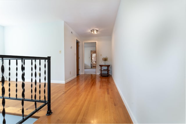 738 Litchfield Rd, Bowdoin, ME 04287 - hallway with light wood-style flooring and baseboards