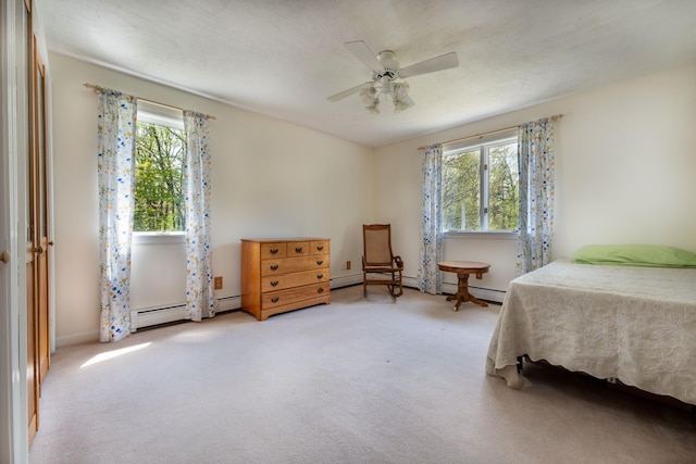 738 Litchfield Rd, Bowdoin, ME 04287 - carpeted bedroom featuring multiple windows and a ceiling fan