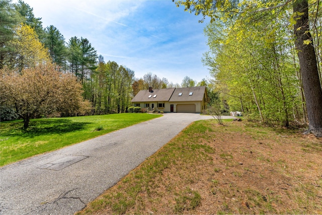 738 Litchfield Rd, Bowdoin, ME 04287 - single story home with a garage, a front lawn, and driveway