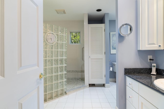 356 Brixham Rd, Eliot, ME 03903 - bathroom with walk in shower, tile patterned flooring, vanity, a closet, and baseboards