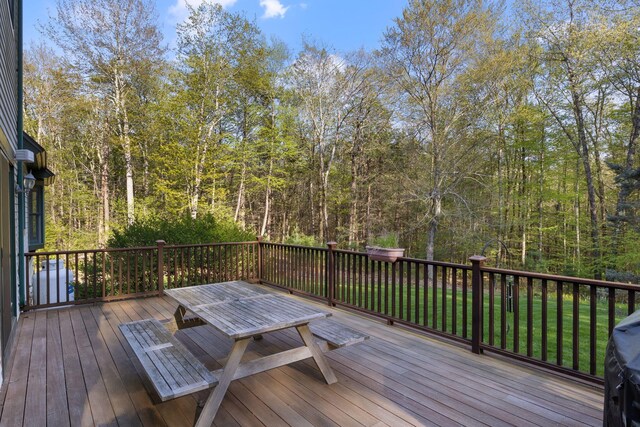 356 Brixham Rd, Eliot, ME 03903 - deck with outdoor dining area and a view of trees