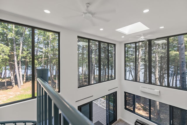5 Zakelo Island Rd, Harrison, ME 04040 - detailed view of a skylight, a ceiling fan, recessed lighting, and a wall mounted air conditioner