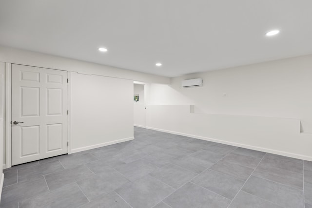 5 Zakelo Island Rd, Harrison, ME 04040 - finished basement with a wall unit AC, recessed lighting, and baseboards