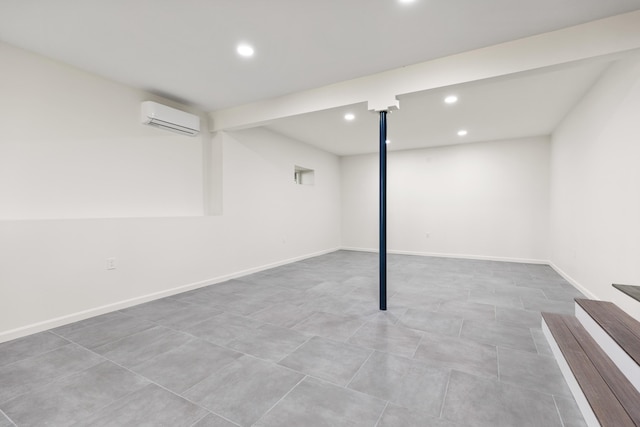 5 Zakelo Island Rd, Harrison, ME 04040 - finished below grade area featuring a wall mounted air conditioner, recessed lighting, and baseboards