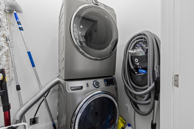 5 Zakelo Island Rd, Harrison, ME 04040 - clothes washing area featuring stacked washer / drying machine