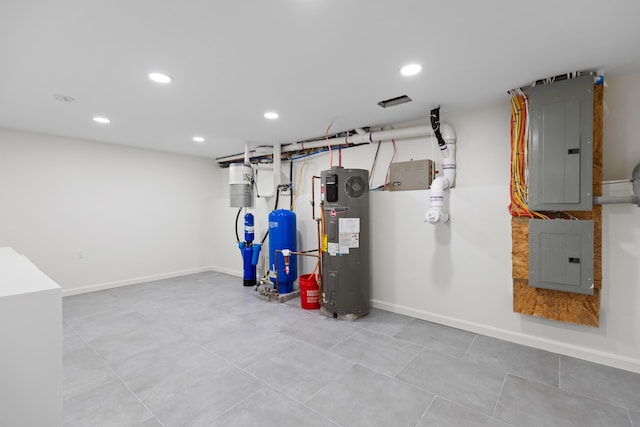 5 Zakelo Island Rd, Harrison, ME 04040 - utility room featuring electric panel, heat pump water heater, and a central vacuum unit