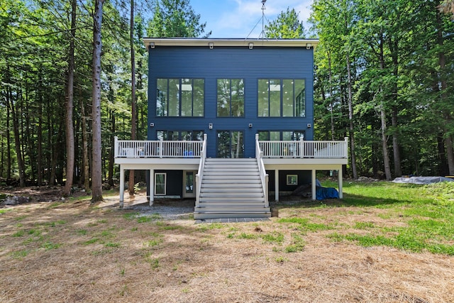 5 Zakelo Island Rd, Harrison, ME 04040 - rear view of house with stairway and a wooden deck