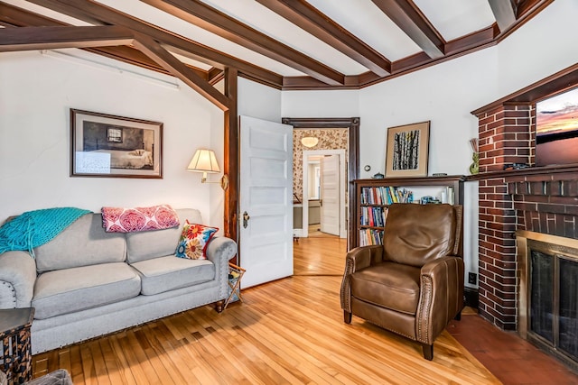 30 Morrill Ave, Waterville, ME 04901 - living area featuring hardwood / wood-style floors, a brick fireplace, and beamed ceiling