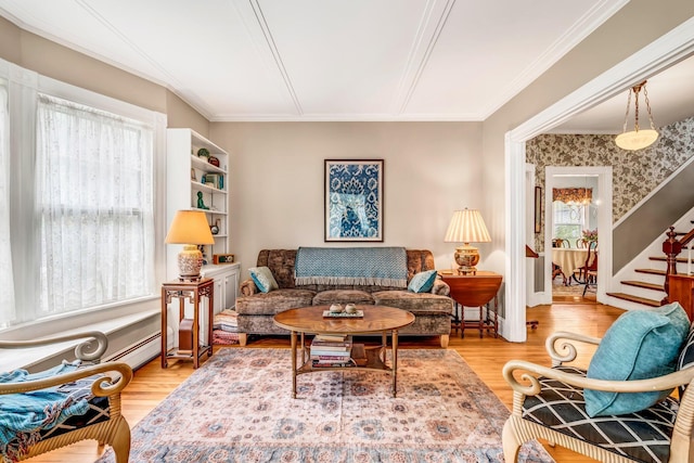 30 Morrill Ave, Waterville, ME 04901 - living area featuring plenty of natural light, crown molding, wood finished floors, and stairway