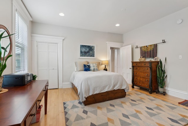 377 Cumberland Ave, Portland, ME 04101 - bedroom featuring light wood-style flooring, baseboards, recessed lighting, and a closet