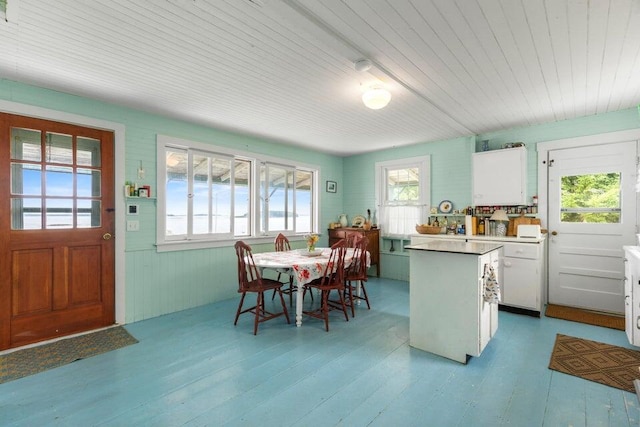 13 Bustins Is, Freeport, ME 04032 - dining space featuring wooden ceiling, light wood-style flooring, and wooden walls