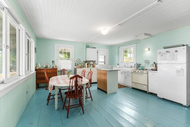 13 Bustins Is, Freeport, ME 04032 - dining space featuring wood walls and light wood finished floors