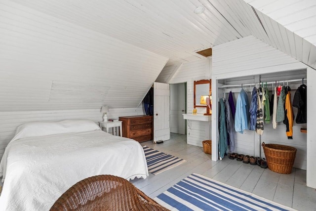 13 Bustins Is, Freeport, ME 04032 - bedroom with a closet, lofted ceiling, hardwood / wood-style flooring, wood walls, and wood ceiling