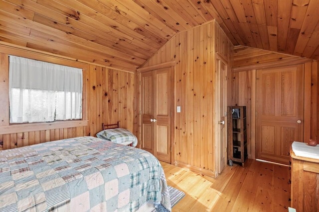 13 Bustins Is, Freeport, ME 04032 - bedroom featuring vaulted ceiling, wooden walls, wooden ceiling, and light wood-style flooring