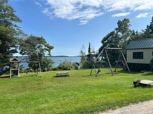 13 Bustins Is, Freeport, ME 04032 - view of grassy yard featuring a playground and a water view