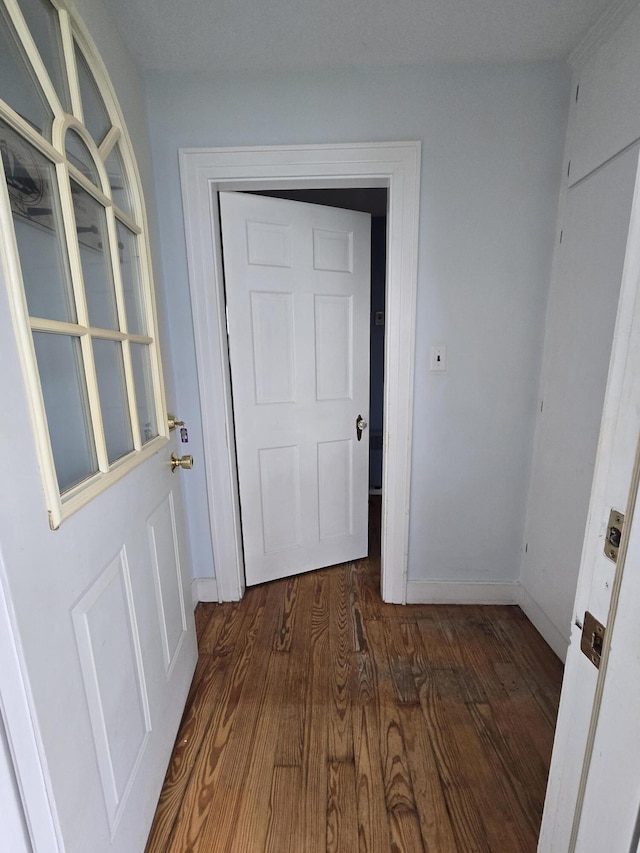 22 Summer St, Lubec, ME 04652 - corridor featuring wood finished floors and baseboards