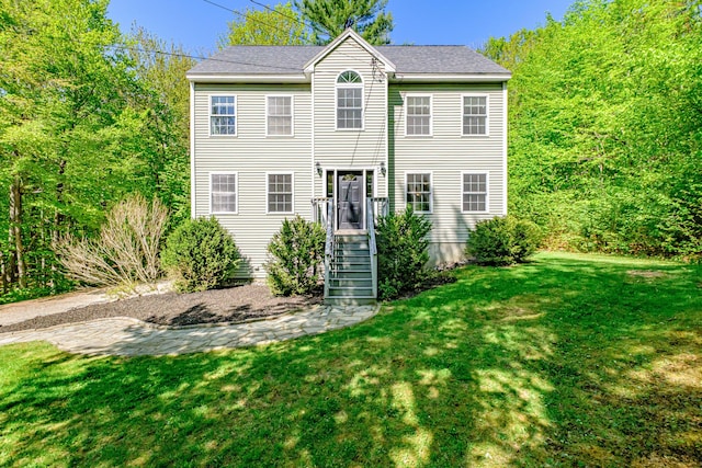 9 Eisenhower Ct, Naples, ME 04055 - colonial home featuring a front yard