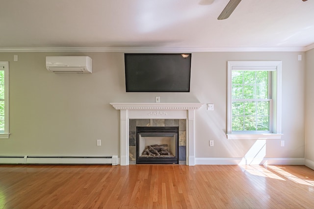 9 Eisenhower Ct, Naples, ME 04055 - unfurnished living room featuring a wall mounted air conditioner, a baseboard radiator, wood finished floors, crown molding, and ceiling fan