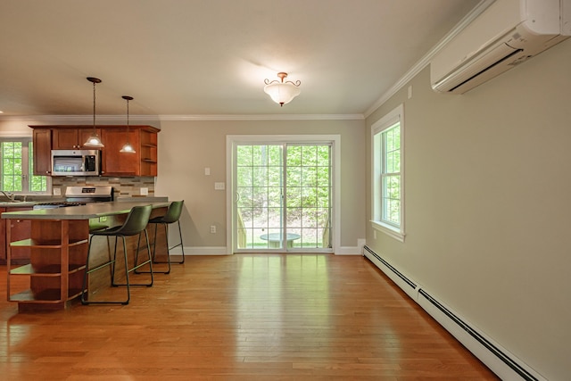 9 Eisenhower Ct, Naples, ME 04055 - kitchen with baseboard heating, a wall mounted AC, open shelves, appliances with stainless steel finishes, and light wood finished floors
