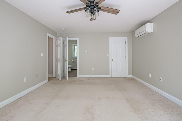 9 Eisenhower Ct, Naples, ME 04055 - unfurnished bedroom featuring a wall mounted AC, baseboards, and light colored carpet