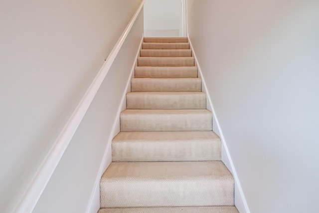 9 Eisenhower Ct, Naples, ME 04055 - staircase with carpet floors