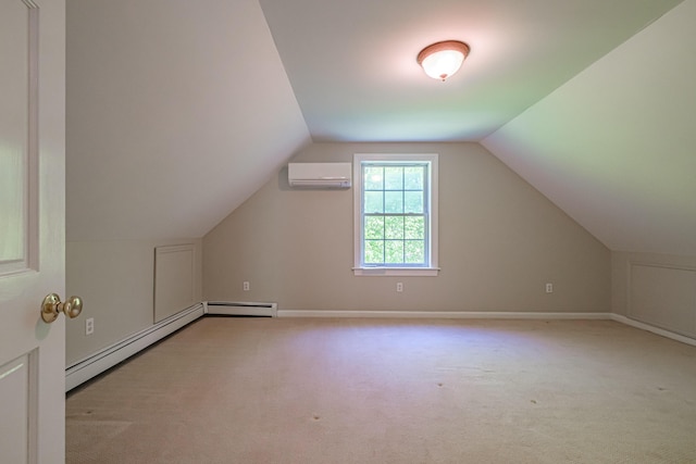 9 Eisenhower Ct, Naples, ME 04055 - bonus room featuring a wall mounted air conditioner, carpet floors, vaulted ceiling, a baseboard radiator, and baseboards