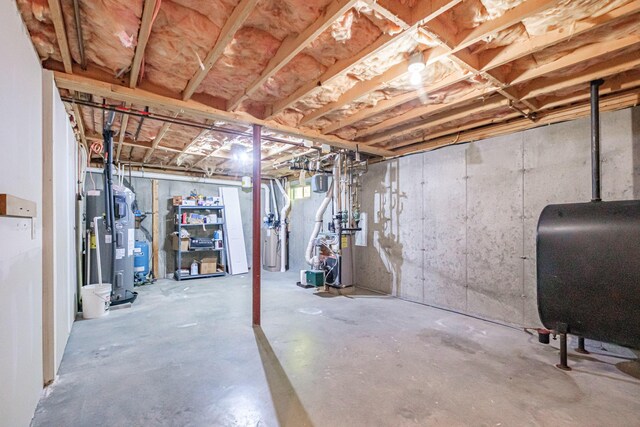9 Eisenhower Ct, Naples, ME 04055 - unfinished basement featuring oil tank and a heating unit