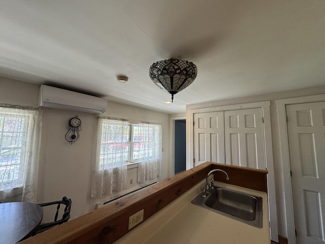 4 Main St, Saint Albans, ME 04971 - detailed view of an AC wall unit, a sink, a smoke detector, and a baseboard heating unit