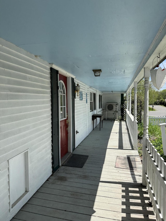 4 Main St, Saint Albans, ME 04971 - wooden terrace with a cooling unit