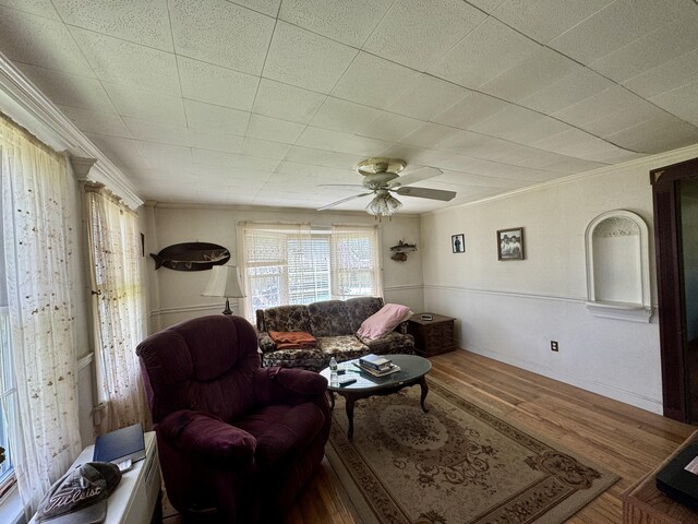 4 Main St, Saint Albans, ME 04971 - living room with wood finished floors, ornamental molding, and ceiling fan