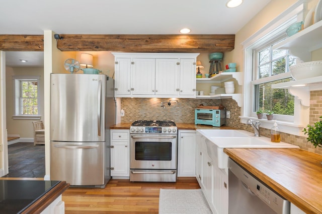 603 S Freedom Rd, Albion, ME 04910 - kitchen with appliances with stainless steel finishes, wood counters, open shelves, recessed lighting, and healthy amount of natural light
