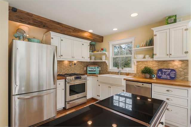603 S Freedom Rd, Albion, ME 04910 - kitchen featuring appliances with stainless steel finishes, a sink, open shelves, white cabinetry, and recessed lighting