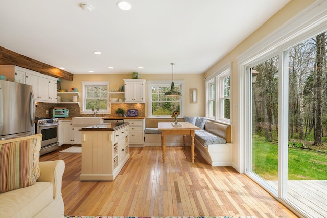 603 S Freedom Rd, Albion, ME 04910 - kitchen with open shelves, stainless steel appliances, plenty of natural light, light wood-type flooring, and recessed lighting