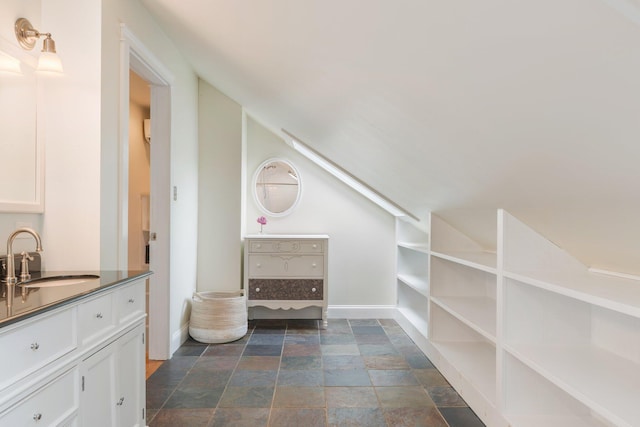 603 S Freedom Rd, Albion, ME 04910 - additional living space featuring a sink, stone finish flooring, lofted ceiling, and baseboards