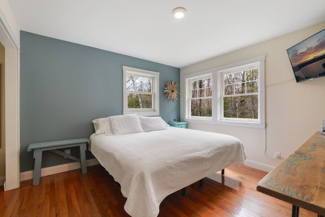 603 S Freedom Rd, Albion, ME 04910 - bedroom with baseboards and wood finished floors