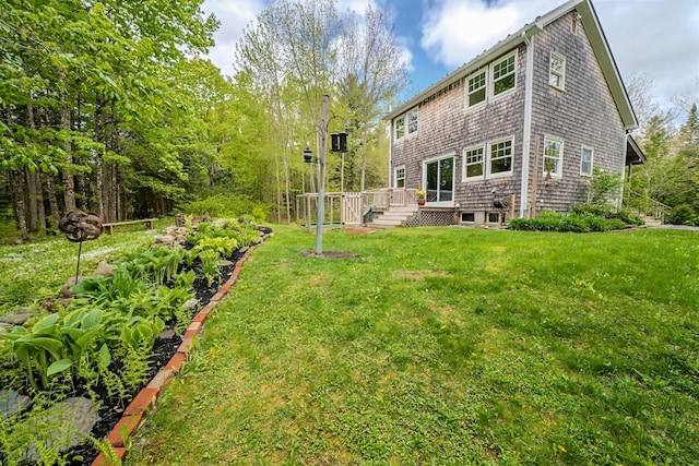 603 S Freedom Rd, Albion, ME 04910 - view of green lawn featuring a vegetable garden